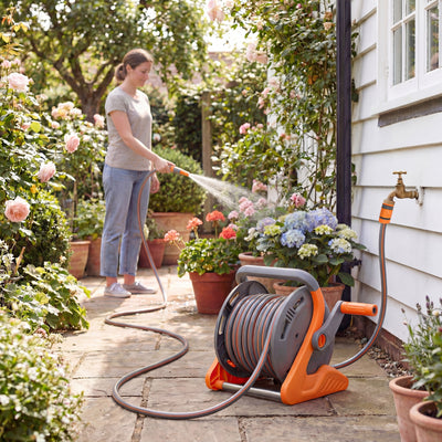 Outsunny Portable Garden Hose Reel, 20+2 m Wall Mounted Hose Reel with 2 Patterns Spray Nozzle and Crank Handle, Orange 