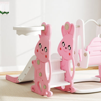 AIYAPLAY 4 in 1 Kids Slide and Swing Set with Climber, Basketball Hoop, Rabbit-Themed, Pink 