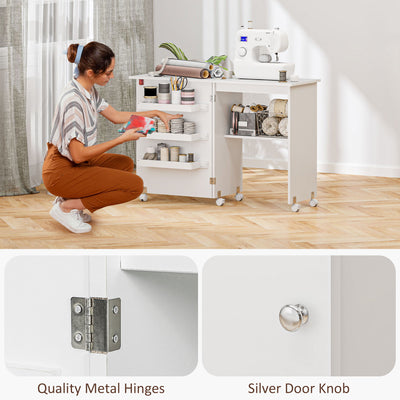 HOMCOM Folding Sewing Table, Drop Leaf Craft Table with Storage Bins, Open Shelf and Wheels, Rolling Sewing Machine Cabinet Computer Desk for Small Space, White 