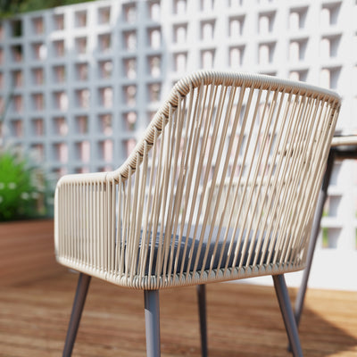Outsunny 4 Seater Rattan Dining Set, Rattan Garden Furniture Set with Parasol Hole, Outdoor Dining Table and Chairs Set with Cushions, Round Glass Top Table for Patio, Balcony, Light Brown 