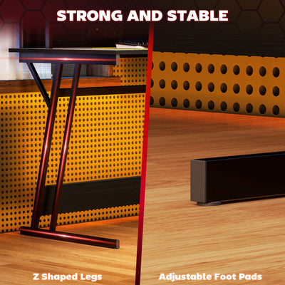 HOMCOM Gaming Desk with LED Lights and Power Outlets, 100 x 60cm Z Shaped Computer Desk with Monitor Stand and Steel Frame, PC Gaming Table for Home Office, Black 