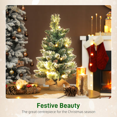 HOMCOM 60 cm Prelit Small Christmas Tree, Snow Flocked Tabletop Mini Xmas Tree with 35 LED Lights, Pine Cones and Linen Cover Base, Battery Operated, Green 