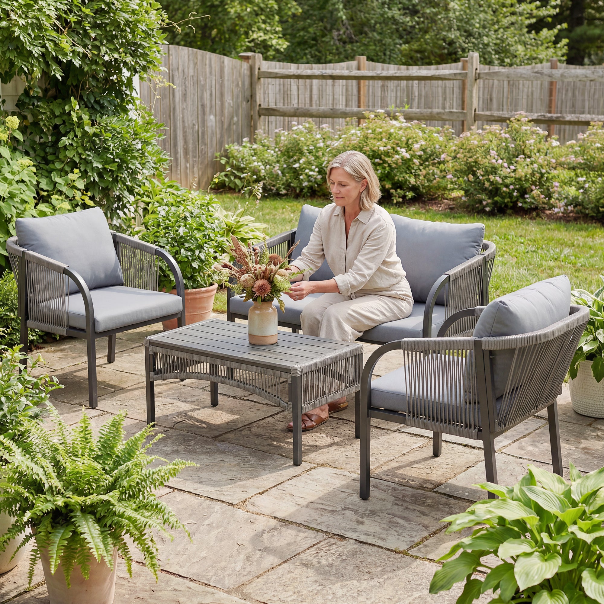 Outsunny 4 Piece Rattan Garden Furniture Set with Loveseat, Armchairs, Table, Steel Frame Wicker Patio Conversation Set, Grey 