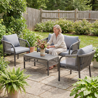 Outsunny 4 Piece Rattan Garden Furniture Set with Loveseat, Armchairs, Table, Steel Frame Wicker Patio Conversation Set, Grey 