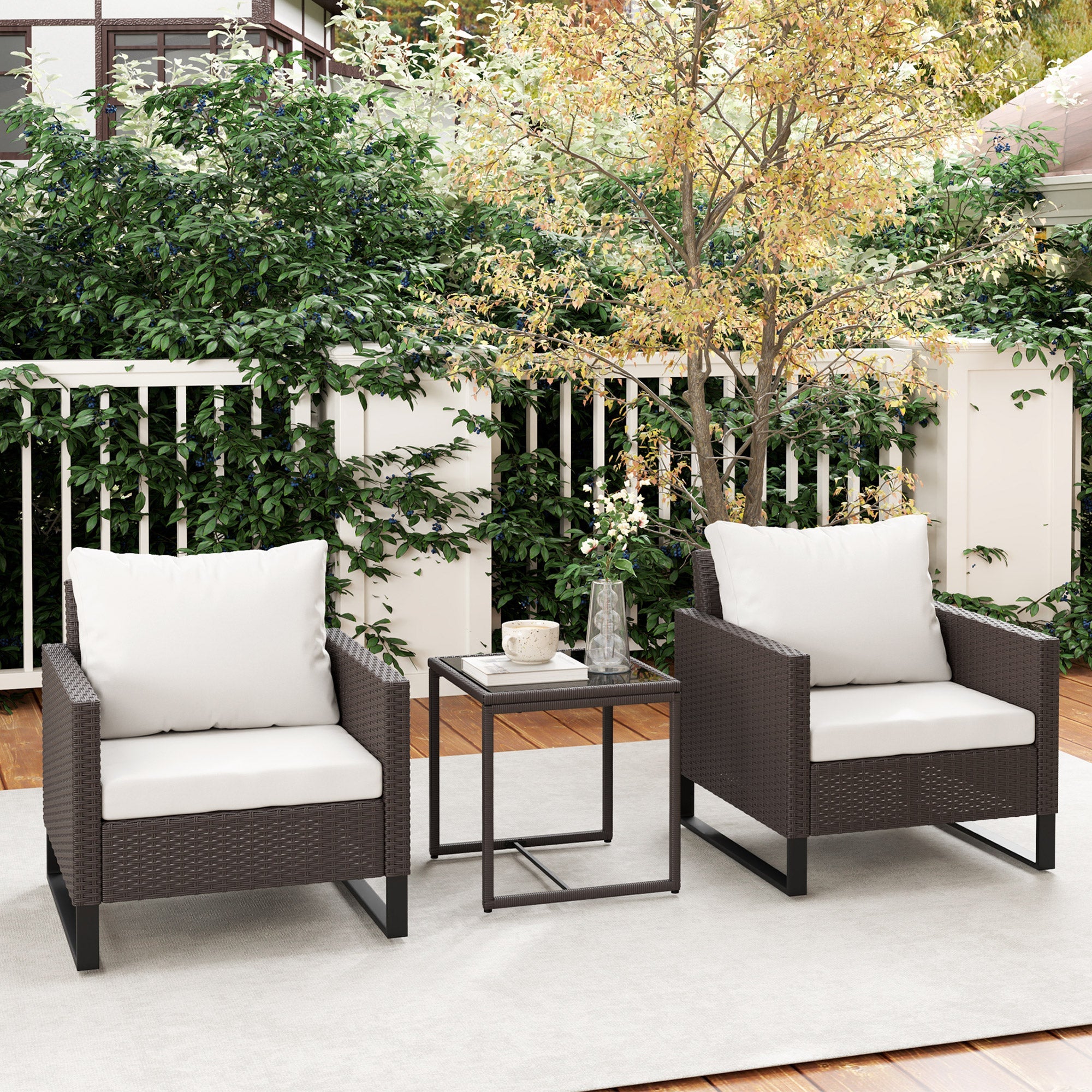 Outsunny 3 Pieces Rattan Bistro Set with 4 Cushions, Wicker Garden Furniture Set, Glass Top Coffee Table and Chairs for Outdoor Patio, Balcony, Terrace and Conservatory, Brown 