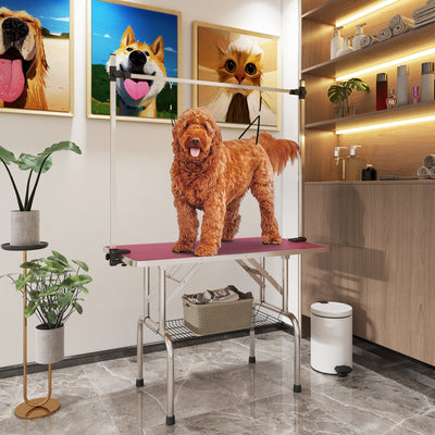 PawHut 42" Dog Grooming Table, Adjustable Pet Cat Drying Beauty Table with 2 Loops Storage Basket, Rubber Top, Pink 