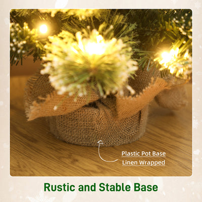 HOMCOM 60 cm Prelit Small Christmas Tree, Snow Flocked Tabletop Mini Xmas Tree with 35 LED Lights, Pine Cones and Linen Cover Base, Battery Operated, Green 