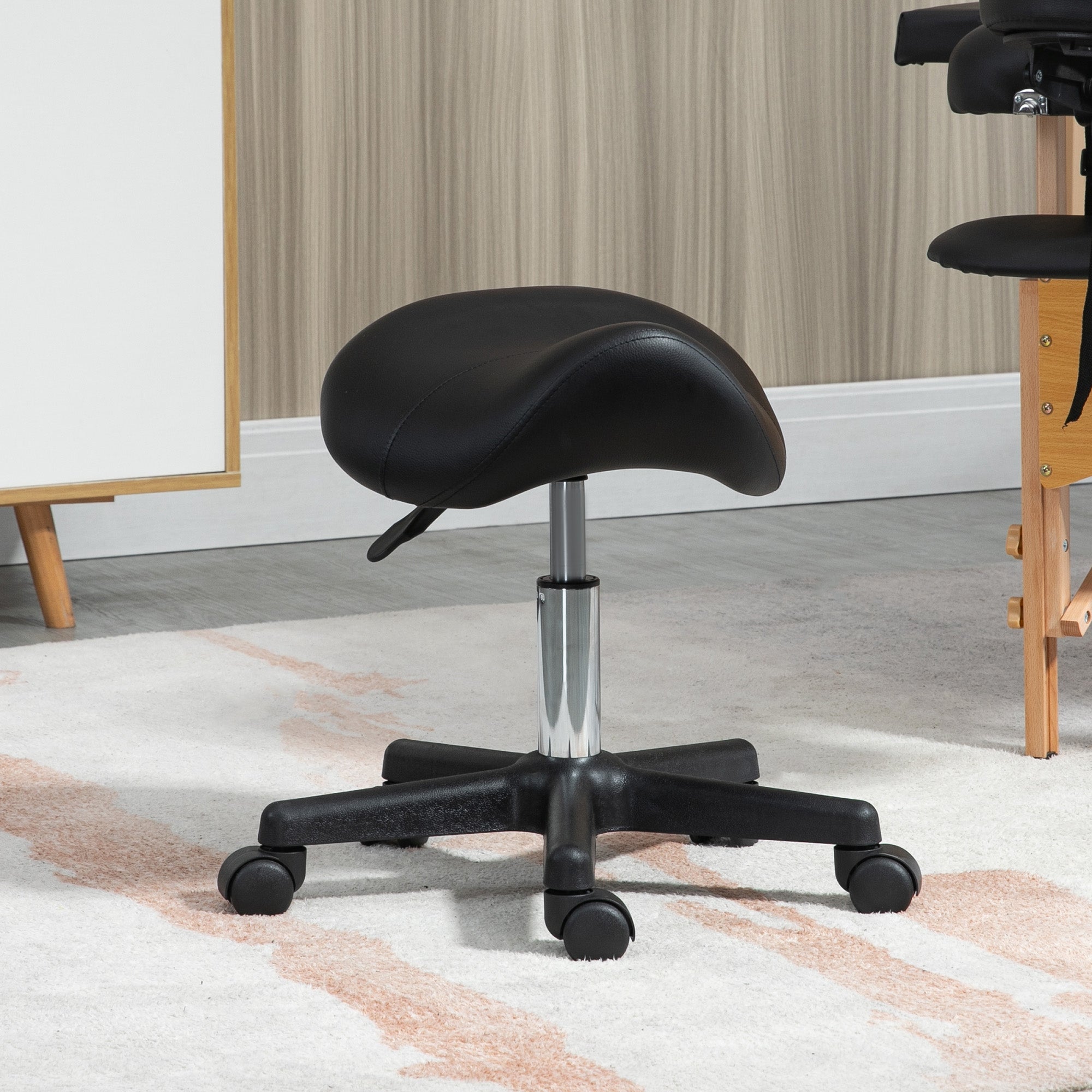 HOMCOM Saddle Stool, PU Leather Adjustable Rolling Salon Chair with Steel Frame for Massage, Spa, Beauty and Tattoo, Black 