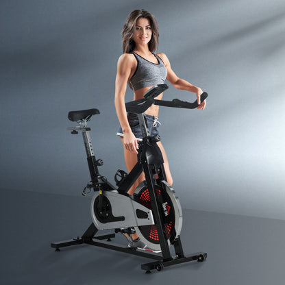 HOMCOM Indoor Exercise Bike, Stationary Bike, Cycling Machine with Adjustable Seat & Resistance, Wheels, 18kg Flywheel, Cup Holder and LCD Monitor