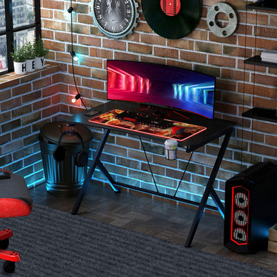 HOMCOM Gaming Desk 108 x 66 cm PC Computer Desk with Whole Board, A Shaped Gaming Table for Home Office with Cup Holder and Headphone Hook, Black 