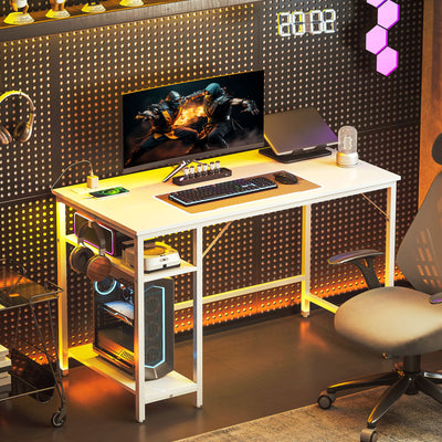 HOMCOM 120 x 60 cm Computer Desk with Power Outlets and Reversible Shelves - White 