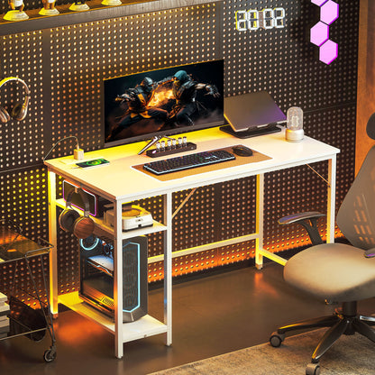 HOMCOM 120 x 60 cm Computer Desk with Power Outlets and Reversible Shelves - White
