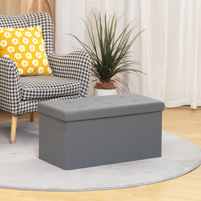 HOMCOM Storage Ottoman Bench, 89L PU Leather Folding Foot Rest Stool, End of Bed Bench, Easy Assembly, for Living Room, Bedroom, Entryway, Grey 