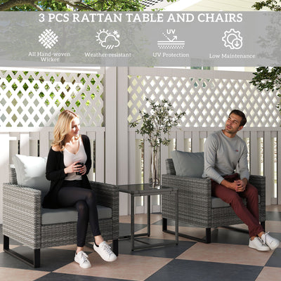 Outsunny 3 Pieces Rattan Bistro Set with 4 Cushions, Wicker Garden Furniture Set, Glass Top Coffee Table and Chairs for Outdoor Patio, Balcony, Terrace and Conservatory, Grey 